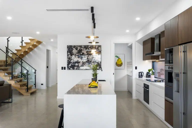 Modern Kitchen Design of a two storey home in Australia by Lofty Building Group